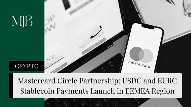 News headline about Mastercard, Circle Partnership, overlaid with a picture of Mastercard on a phone, published by MJB