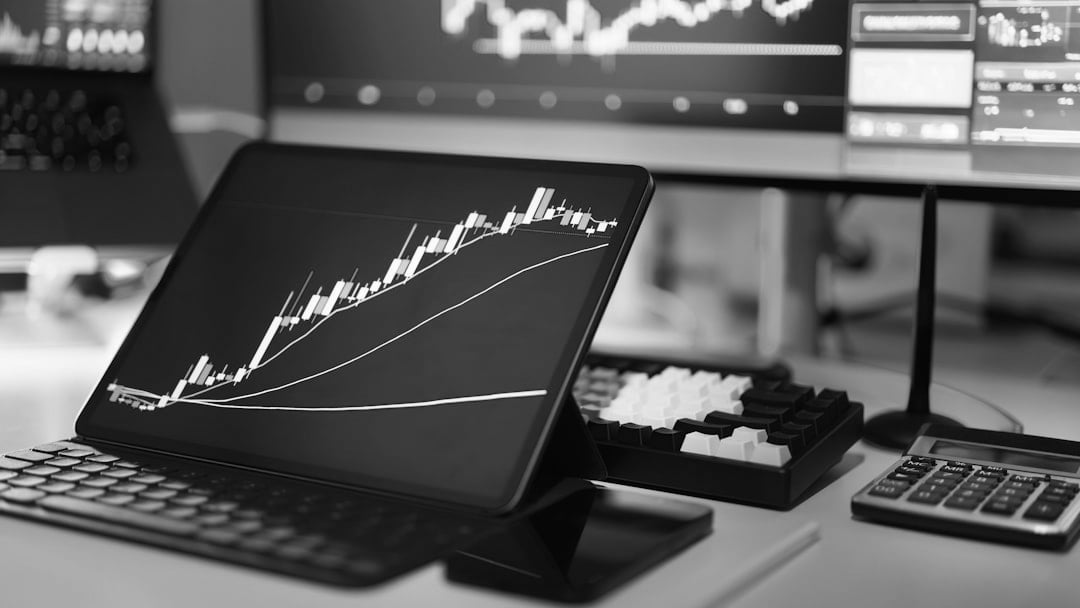 A laptop computer sitting on top of a desk, illustrating UK equity fund inflows