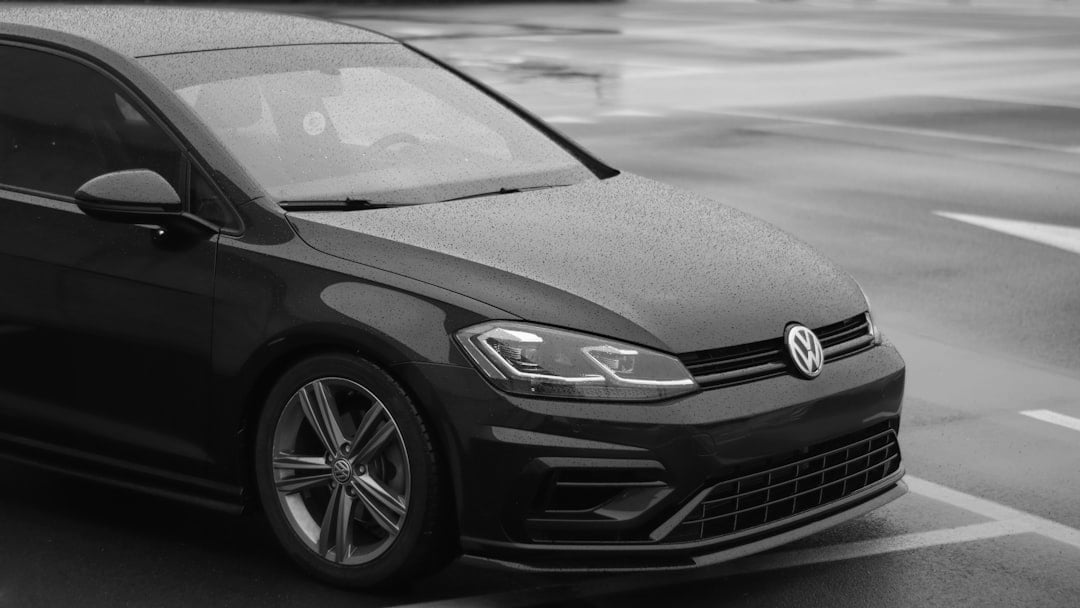 a blue volkswagen car parked in a parking lot, illustrating Volkswagen share price